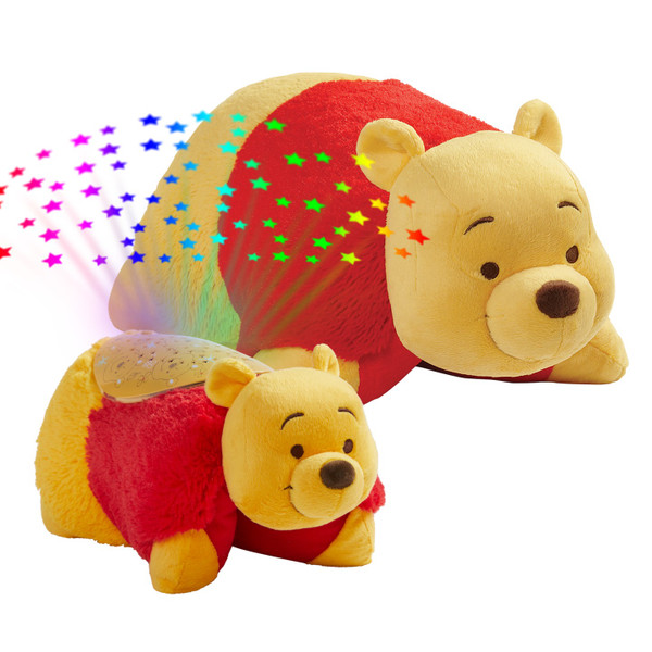 Winnie the Pooh Sleeptime Lite and Winnie the Pooh Pillow Pet together, with the Sleeptime Lite projecting colorful rainbow stars.