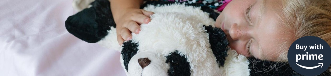 The Buy with Prime Banner shows a little girl snuggling with a Panda Pillow Pet.