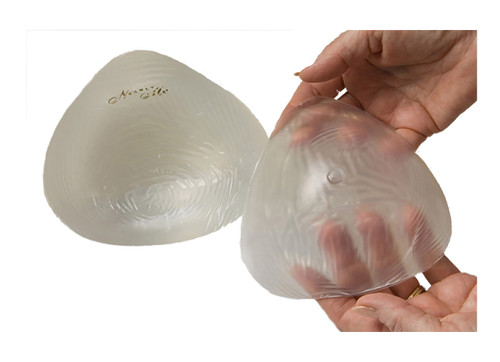 Shop the Nearly Me 360 Athletic Swim Form, a lightweight, waterproof post-mastectomy breast prosthesis designed for swimming, hot tubs, and active lifestyles. Comfortable, secure fit for breast cancer recovery.