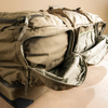 Close-up of Hercules Duffel external pocket with elastic sleeve for small-item organization