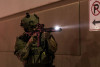 Black SureFire M640DFT-PRO Turbo Scout weapon light with dual-fuel capability and high-candela beam output.