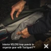 Vertx RLT 50L Duffel Bag VTX-VTX5096 Ranger Green interior VELCRO loop panels with hands organizing gear using Tactigami system
