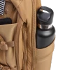 Vertx Siege 15L Sling Pack VTX5306 coyote brown close-up of stretchable side pocket with black water bottle fully seated and secure
