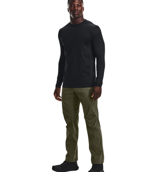 Side profile of Under Armour Tactical ColdGear Infrared Base Crew highlighting slim fit and stretch fabric mobility.