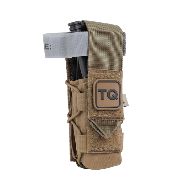 Coyote Brown High Speed Gear TACO tourniquet pouch with a C-A-T tourniquet stowed inside, front view with TQ label