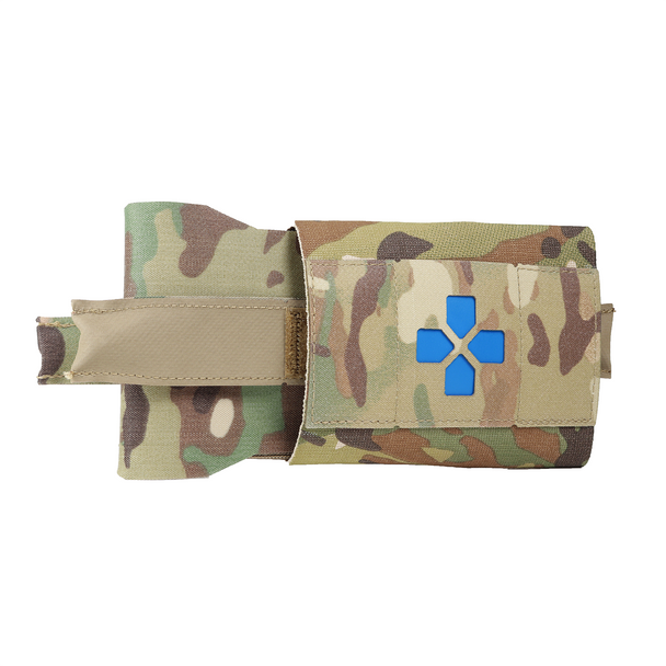 Blue Force Gear micro IFAK pouch with rapid-access pull tabs and organized trauma supplies