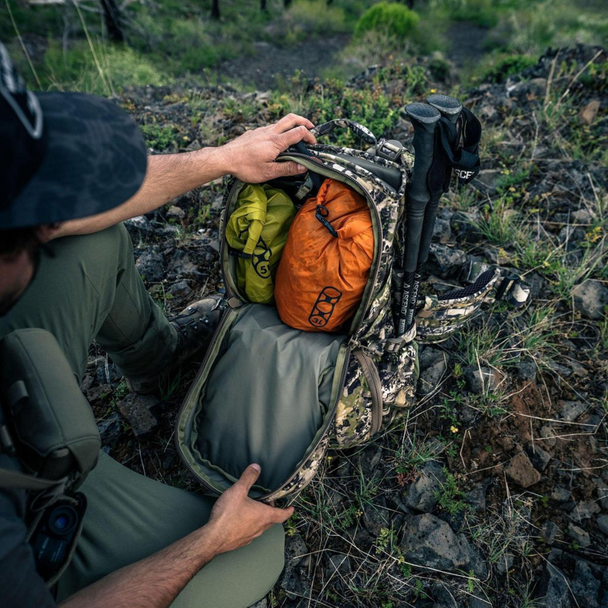 X1 Euro Pack resting on the ground with gear organized in its multiple compartments.