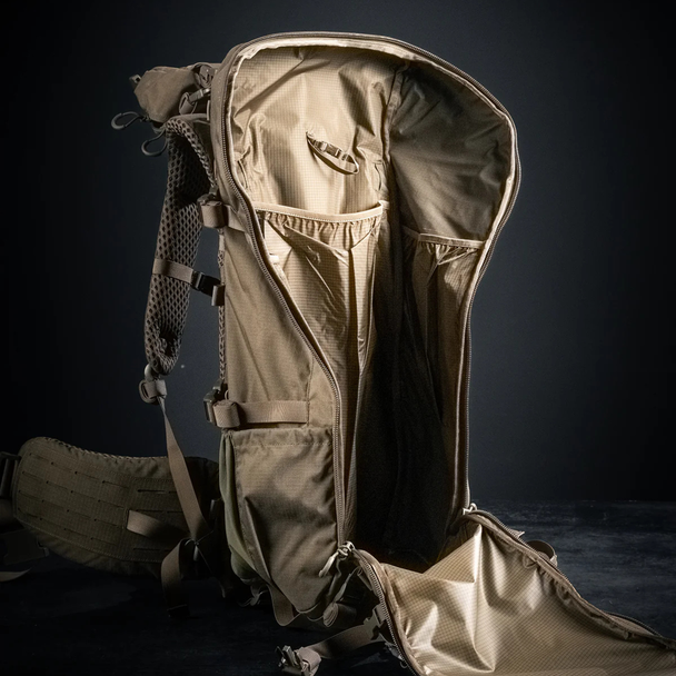 Eberlestock Brute 4500 high-capacity pack main compartment access with dual zipper panel.