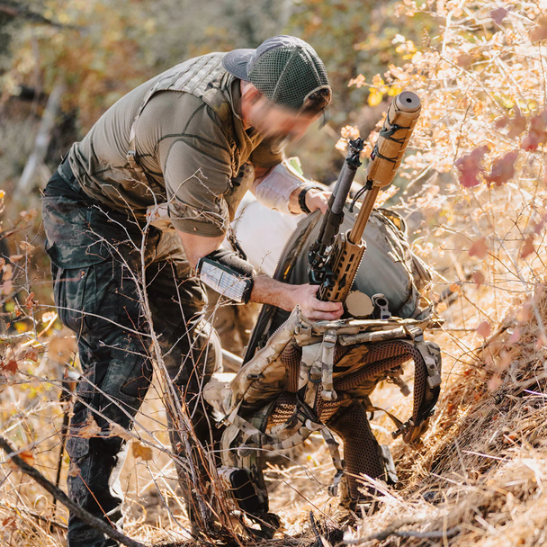 Eberlestock W2 Spectre Sniper Pack deploying bolt action rifle