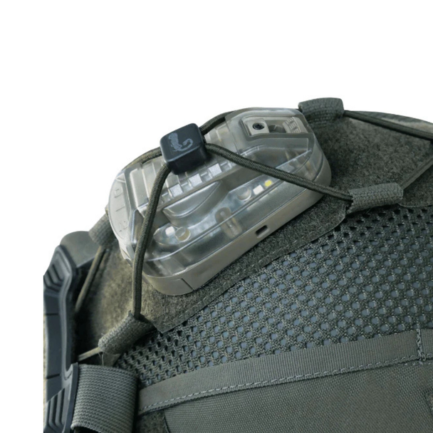Agilite Ops-Core Maritime FAST SF Super High Cut Helmet Cover Gen 4 Ranger Green close-up of helmet top showing strobe light secured under bungee retention cord with loop cord locks on solid Velcro panel