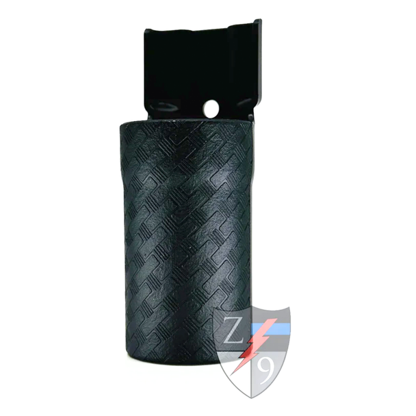 Empty Zero9 OC spray case showing the textured body and paddle clip attachment, white background