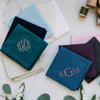 Solid color men's handkerchiefs. Samples of what the handkerchiefs look like when they are monogrammed.