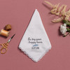 Happy tear white lace handkerchief with embroidered message, personalized date and feather in powder blue.