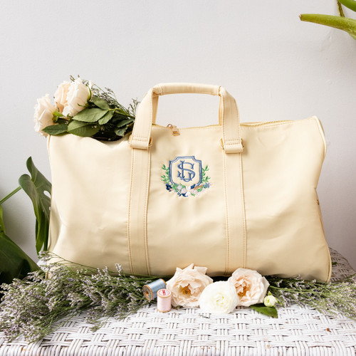 https://cdn11.bigcommerce.com/s-r89m1h1k/images/stencil/500x659/products/429/3259/Custom_Wedding_Crest_Embroidery_Personalized_Duffel_Bag__06070.1683050072.jpg?c=2