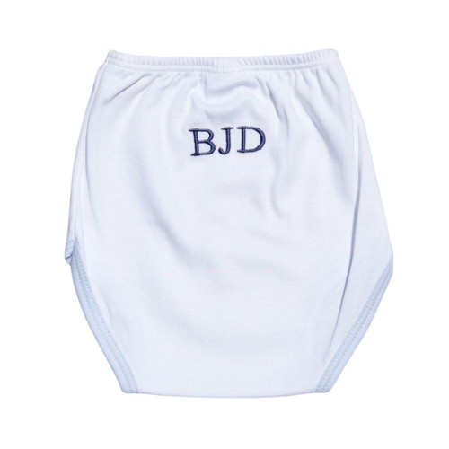 White baby bloomers personalized with the baby's monogram in navy blue thread. Shown on wood background.