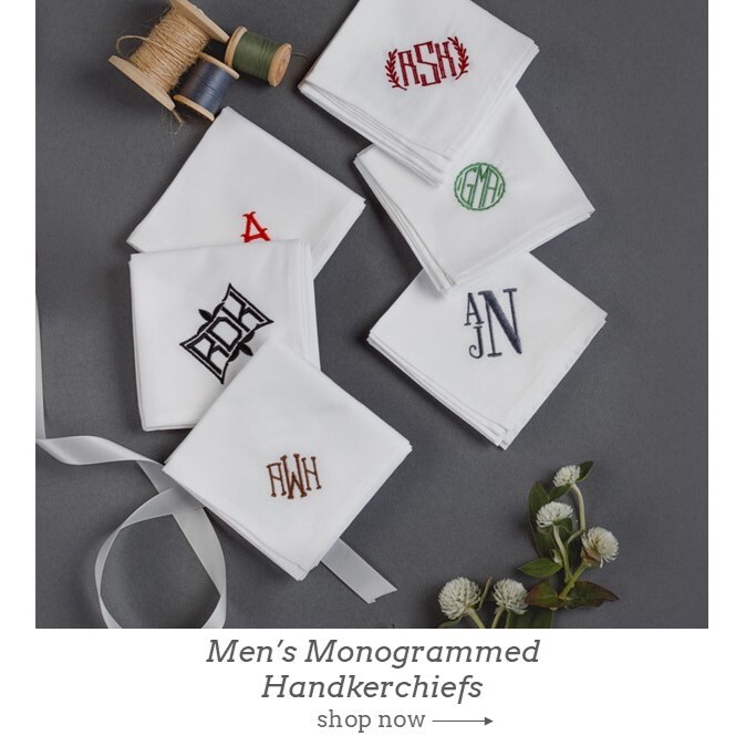 Embroidered men's monogrammed handkerchiefs. Shown in a variety of thread colors on gray background.