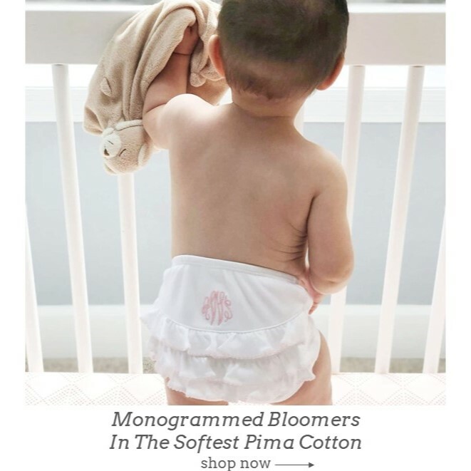 Monogrammed baby bloomers diaper covers shown in white with ruffles in Pima cotton. Pink embroidery. 