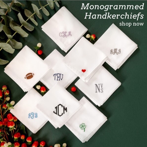 Men's handkerchiefs embroidered with monograms in navy, black, blue and gray. Also, personalized with heart, shamrock and football.Shown with flowers and thread.