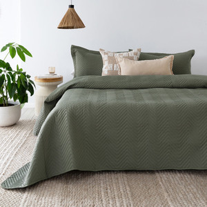 Herringbone Embossed Coverlet Set in Moss styled on the bed Herringbone Embossed Coverlet Set in Moss styled on the bed