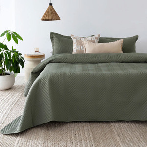 Herringbone Embossed Coverlet Set in Moss styled on the bed Herringbone Embossed Coverlet Set in Moss styled on the bed