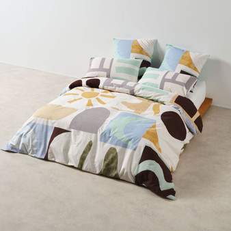 Kiama quilt cover set styled on bed with European pillowcases