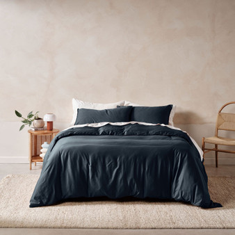 Linen House Surf Wash Midnight quilt cover styled on the bed