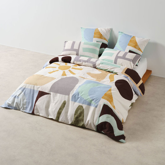 Kiama quilt cover set styled on bed with European pillowcases