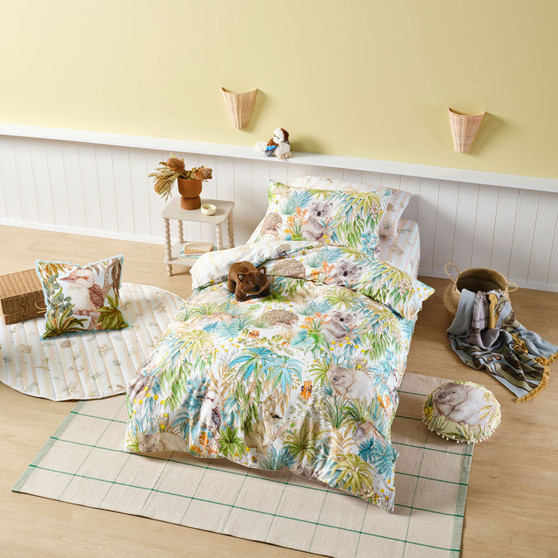Children’s bedroom styled with Linen House Kids Gum Leaf Gully quilt cover set featuring whimsical Australian wildlife and bushland illustrations.