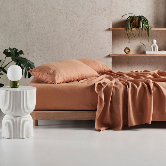 Pure linen sheet set by Linen house in Clay colour showing soft texture and relaxed look