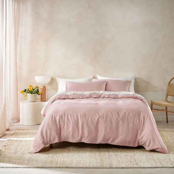 Linen House Surf Wash Dusty Rose quilt cover styled on the bed