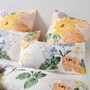 Closeup of of Lyra pillowcase showing hand-painted vintage floral illustration