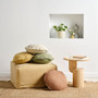 Maya Lifestyle image of round cushions by Linen House