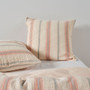 European pillowcase styled with Coolum papaya quilt cover set