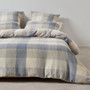 Cornflower blue quilt cover set styled on bed