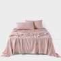 Surf Wash Dusty Rose sheet set styled on bed