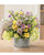 Daisies, lavender, and lilacs faux flower centerpiece arranged in a 7.5 inch galvanized metal bowl, featuring a free-spirited wildflower design with lifelike summer meadow blooms, 17 inches high by 19 inches wide