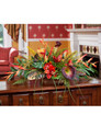 Tropical orchid, calla lily and croton leaves low centerpiece silk flower arrangement