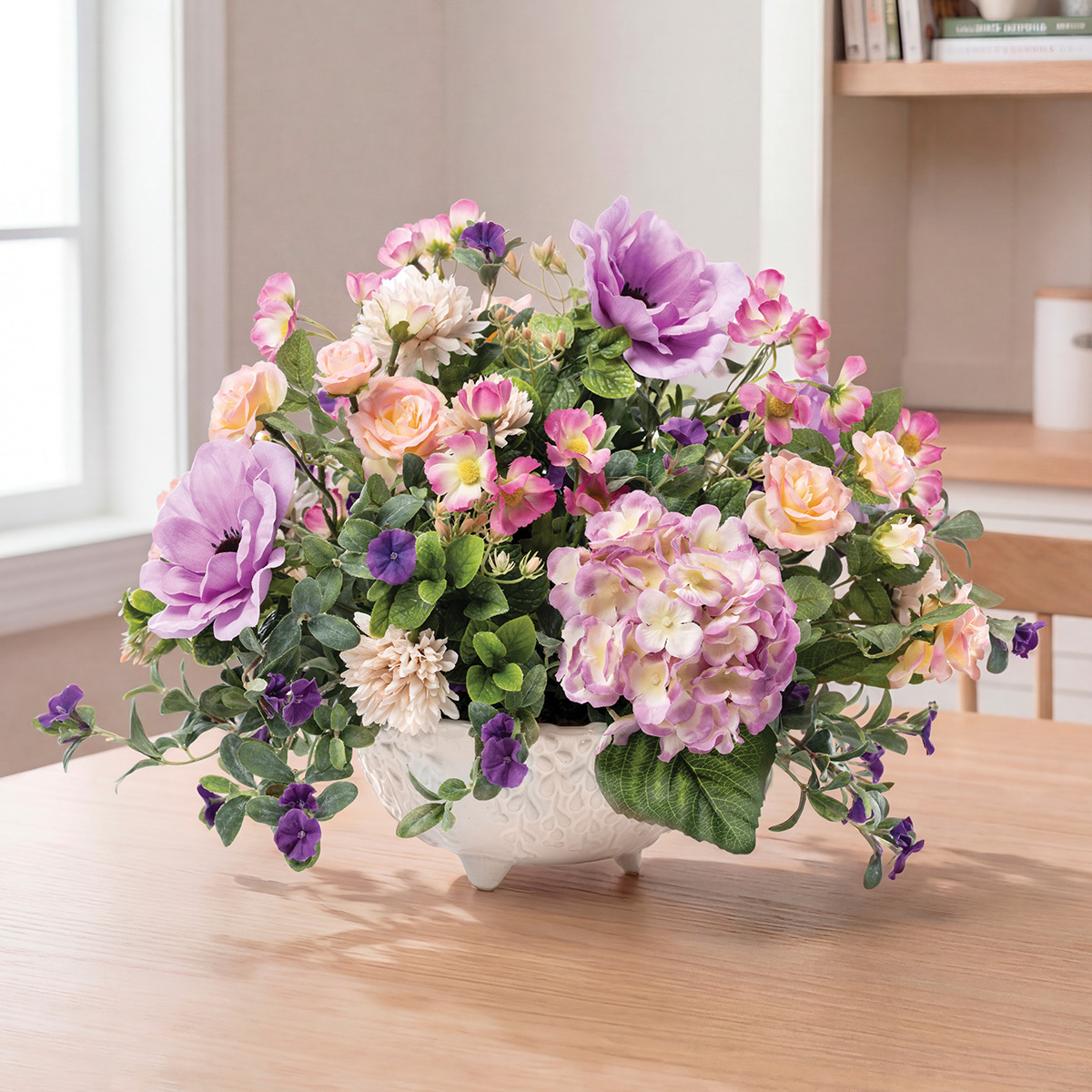 Hydrangea, anemone, and rose centerpiece