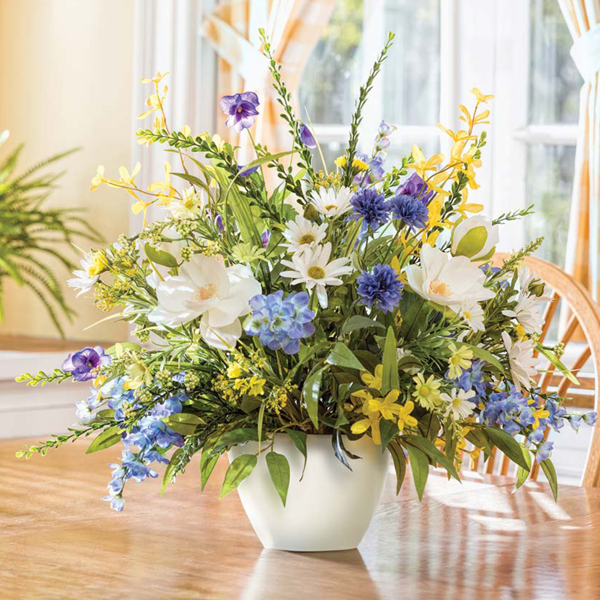 Magnolia, larkspur, and daisy faux arrangement