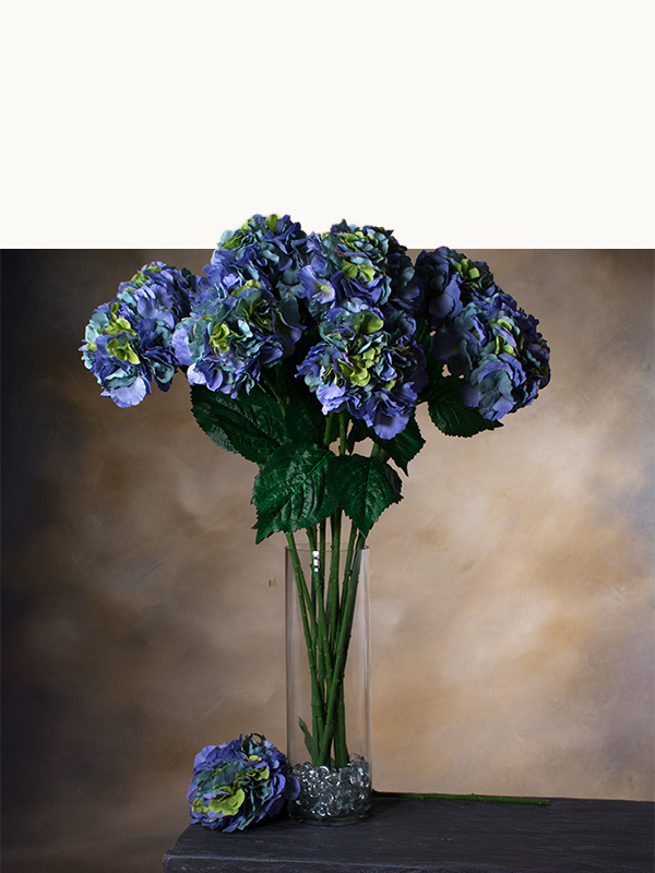Artificial floral stems by Petals including realistic faux roses, greenery, seasonal flowers, and botanical accents for custom bouquet styling and decorating.