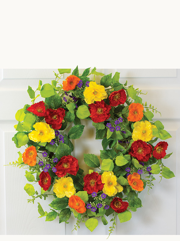 Elegant faux floral wreath by Petals featuring realistic flowers, greenery, and seasonal textures for front door decor, porch styling, and year round decorating.
