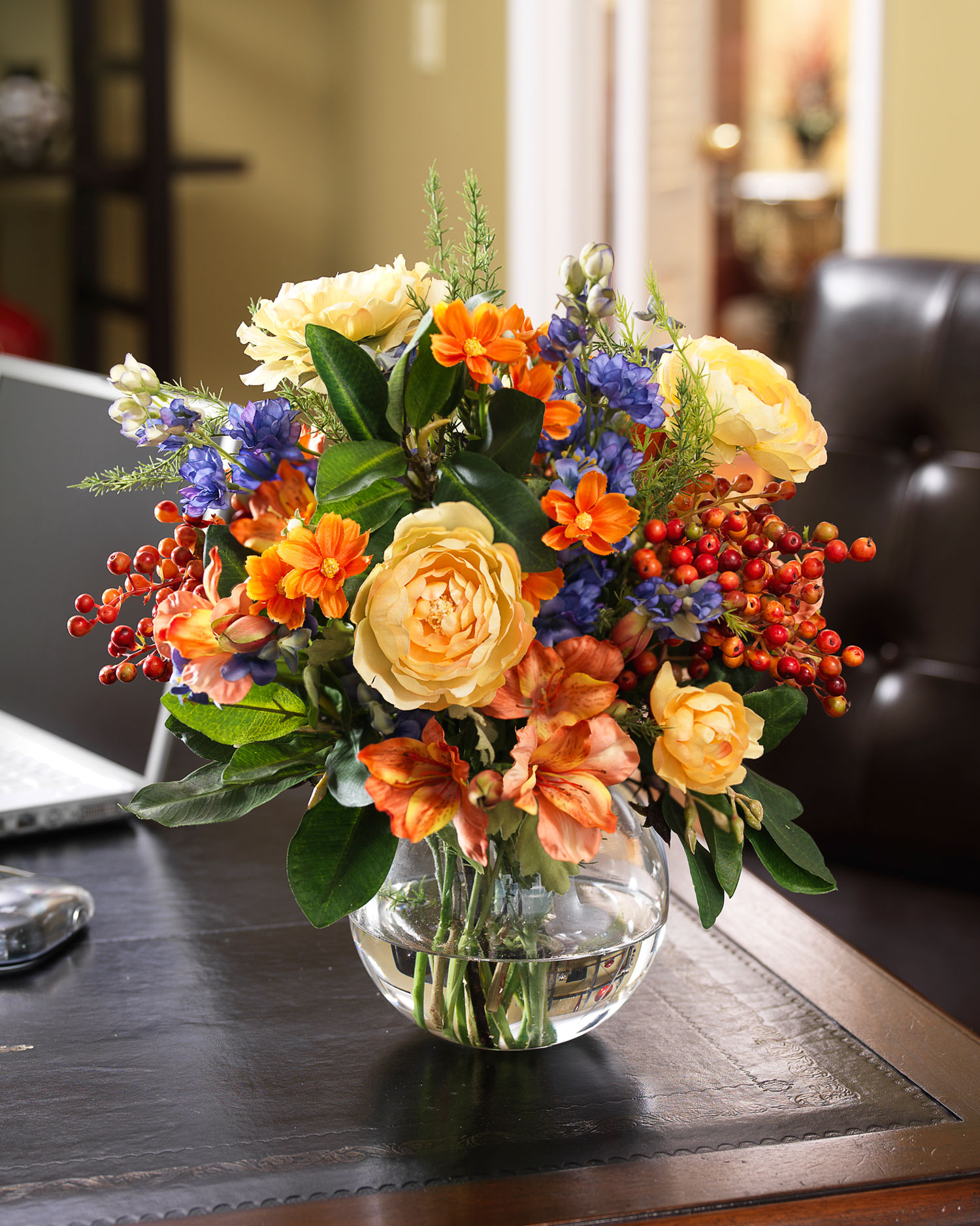 Silk Flower yellow ranunculus, blue delphinium, and colorful berries and coral alstroemeria