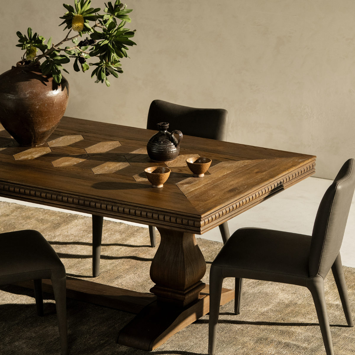 The corner of a detailed timber dining table 