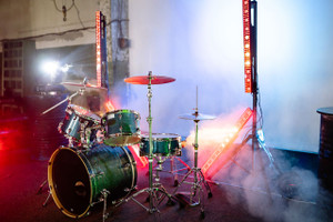 How to Elevate Your Drummer for Better Visibility: The Complete Drum Riser Height Guide