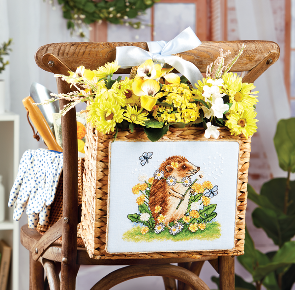 Project image from April 2027 of the Keepsake Calendar. Hedgehog cross-stitch design finished as a flower basket.