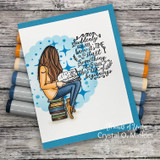 Blue card of the girl on the stack of books with 'start something new, trust the magic of beginnings.'