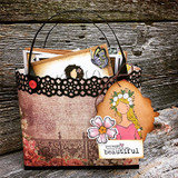 Black lace-trimmed gift basket with a tag of the Planner Gal and a 'you were made to be beautiful' label.