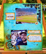 Scrapbook page on a turquoise background with two baseball photos, black swirls and bubble circles along the edges, and orange journaling tags.