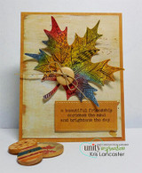 Layered fussy-cut maple leaves in fall colors on a distressed kraft card with 'a beautiful friendship enriches the soul.'