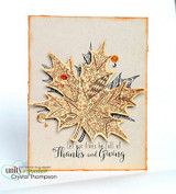 Kraft-colored patterned maple leaf on a cream card with 'Let our lives be full of Thanks and Giving.'